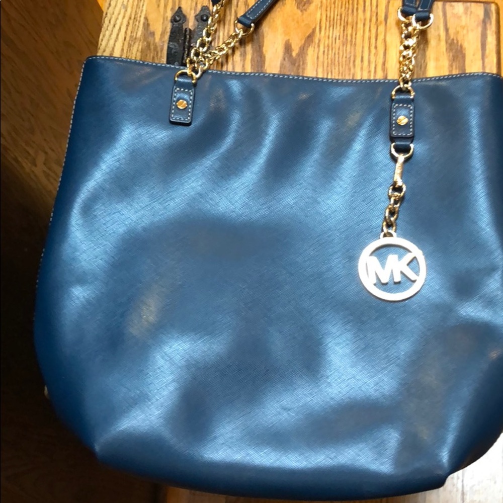 Michael Kors dark teal handbag.